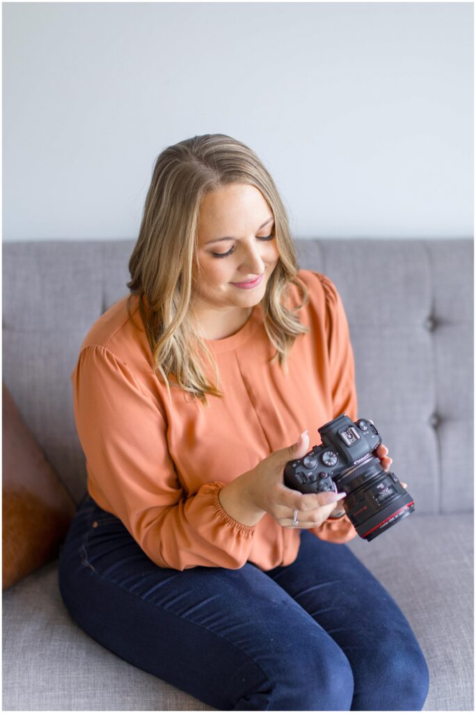 Image from Amanda Steinhauer Photography's Wisconsin personal branding session. Blue-eyed woman softly smiling at her camera.